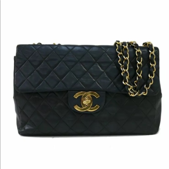 CHANEL Handbags - CHANEL Maxi Black Leather Flap Bag